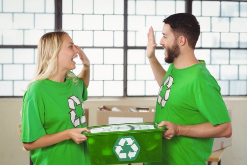 Sorting recyclable waste during Acton rubbish removal